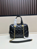 Black patent leather quilted Boston bag