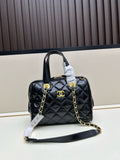 Black patent leather quilted Boston bag