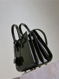 Green patent leather handbag from the Saint Laurent Sac De Jour collection