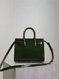 Green patent leather handbag from the Saint Laurent Sac De Jour collection
