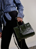Green patent leather handbag from the Saint Laurent Sac De Jour collection