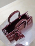 Sac De Jour burgundy patent leather handbag